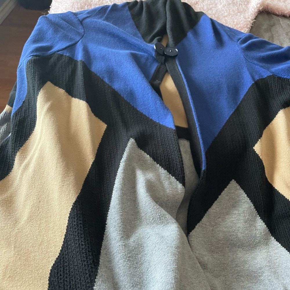 Large multi colored cardigan perfect for cooler weather,